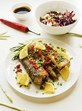 Baked hake fish Stock Photos