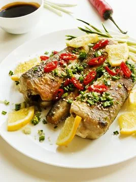 Baked hake fish Stock Photos