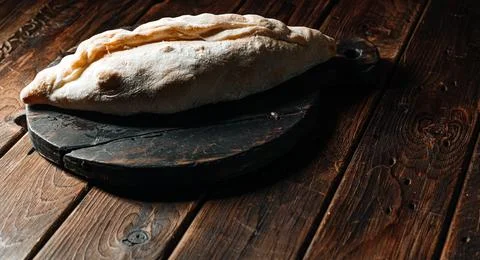 Baked home made bread on the kitchen counter Stock Photos