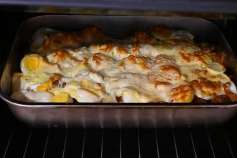 Baked Layered Potato Casserole in Oven Tray, Homemade Food Cooking Process Photos