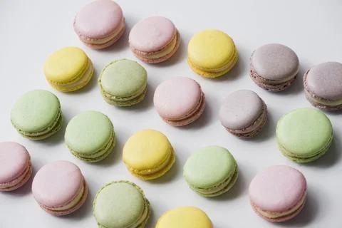 Baked macaroons white backdrop Stock Photos
