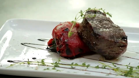 Baked Meat on Red Pepper Stock Footage 132166691