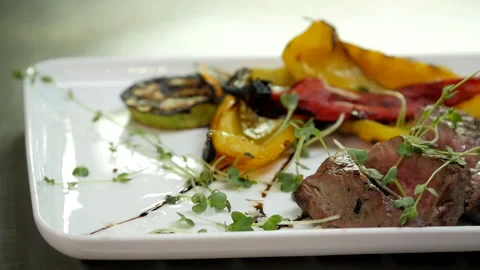 Baked Meat with Vegetables Cooked on Charcoals Stock Footage 132216643