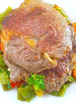 Baked meat with vegetables Stock Photos
