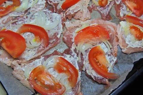Baked meat with vegetables Stock Photos