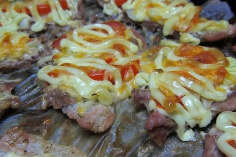 Baked meat with vegetables Stock Photos