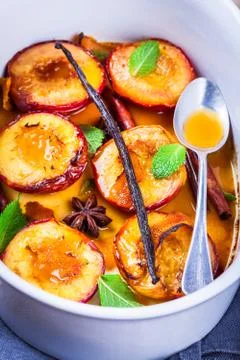 Baked nectarines with  mint Stock Photos