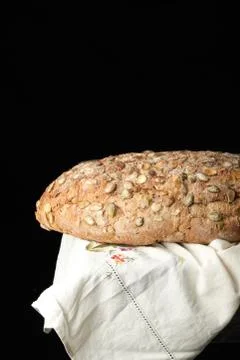 Baked oval bread made from rye flour with pumpkin seeds Stock Photos