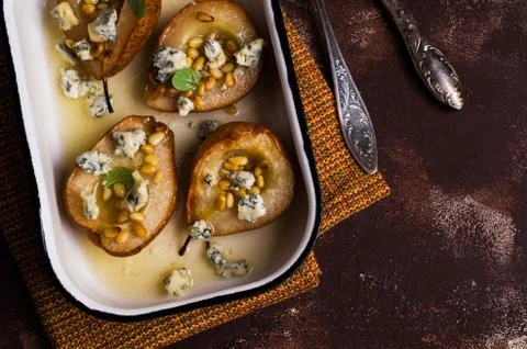 Baked pears with nuts Stock Photos