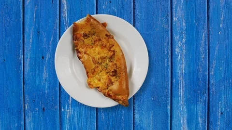 Baked pie disappearing on white plate. Bite by bite stop motion, time lapse. Video stock 94792753