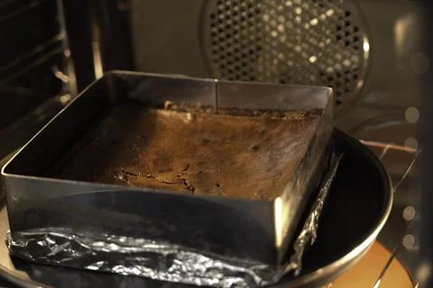 Baked pie in a square baking sheet. pie. Stock Photos