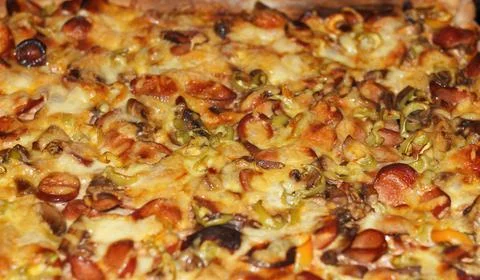 Baked pizza a background Stock Photos
