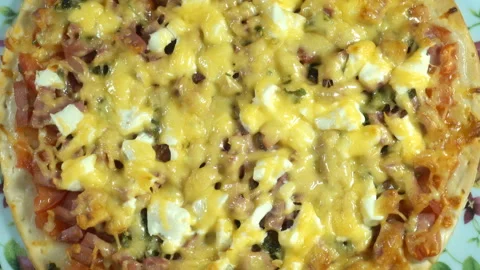 Baked pizza rotates in 4K Stock Footage 139333545