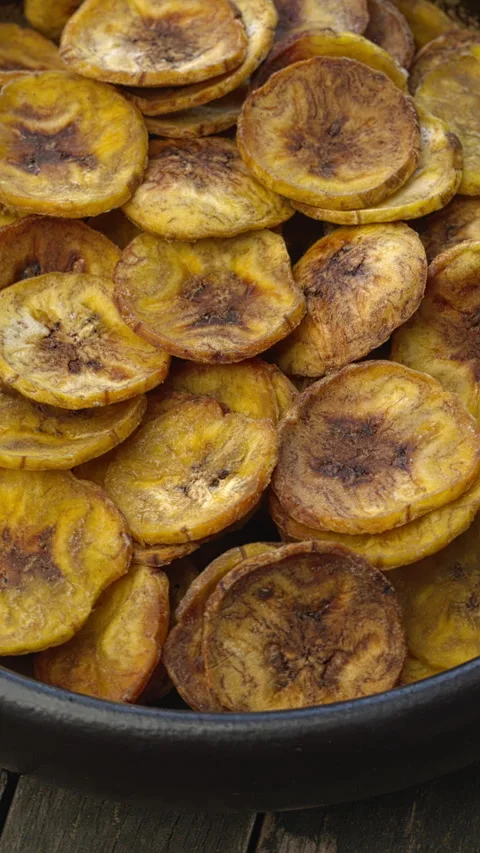 Baked plantain chips. Vertical video. Stock Footage 277274902