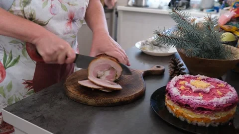 Baked pork belly. The cutting process. Preparing for the holiday. Christmas. Stock Footage 344719241
