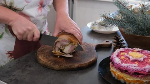 Baked pork belly. The cutting process. Preparing for the holiday. Christmas. Stock Footage 344719243