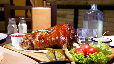 Baked pork knee. Fried beef liver with onions. Horseradish vodka and pork knee. Stock Footage 139279439