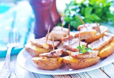 Baked potato with lard Stock Photos