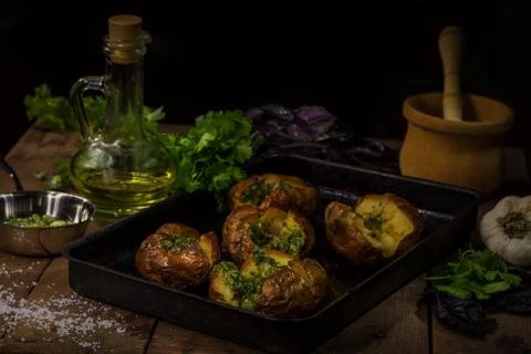 Baked potatoes with cheese and sauce Stock Photos