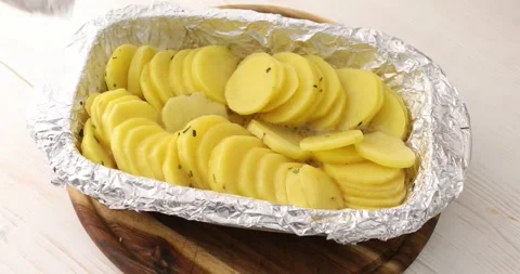 Baked potatoes in foil. Stock Footage 250481921