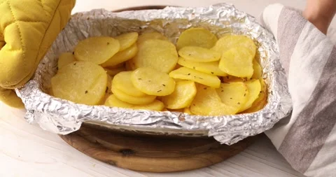 Baked potatoes in foil. Stock Footage 250481986
