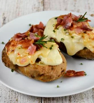 Baked potatoes Stock Photos