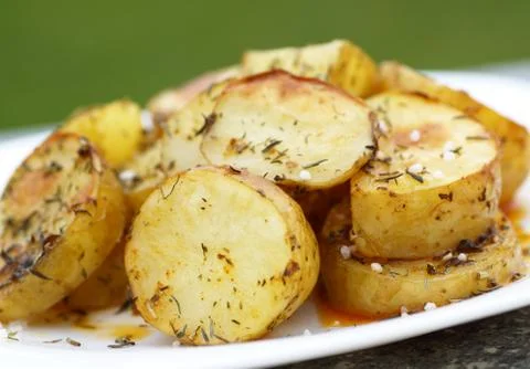 Baked potatoes Stock Photos