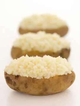 Baked potatoes Stock Photos