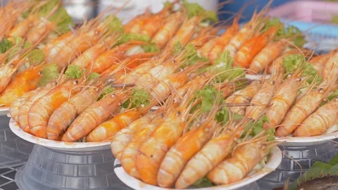Baked prawns are ready serve and selling at seafood festival in phuket. Stock Footage 125596612