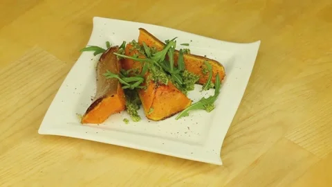 Baked pumpkin with arugula Stock Footage 194176421