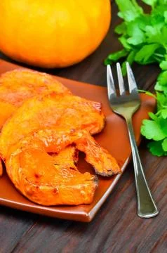 Baked pumpkin slices Stock Photos