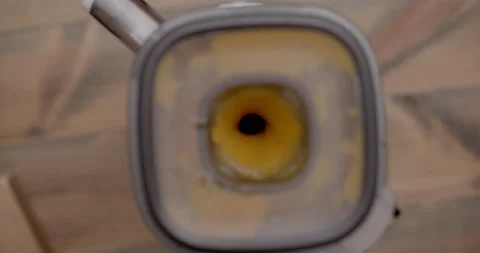 Baked pumpkin is spinning in a blender. Close-up. Stock Footage 201467271