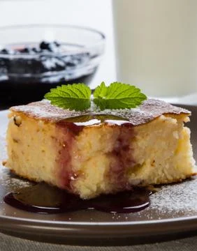Baked rice pudding with syrup Foto stock