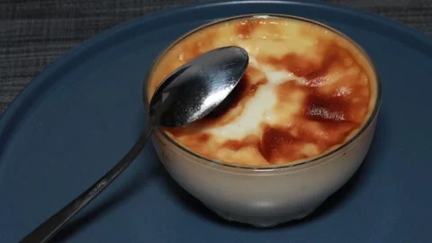 Baked rice pudding with Turkish dessert fresh burn rotates 360 degrees, 4k Stock Footage 248617232