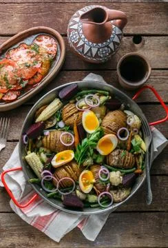 Baked root vegetables in a pan, rustic style Stock Photos
