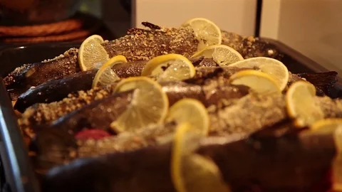 Baked salmon with lemon in baking sheet Stock Footage 70350114