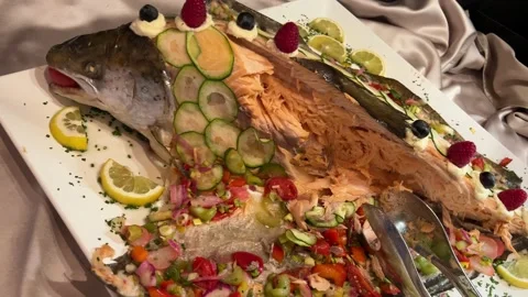 Baked salmon with vegetables Stock Footage 232393488