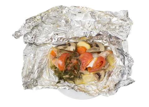Baked salmon with vegetables. Stock Photos