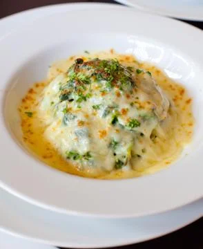Baked spinach with cheese Stock Photos