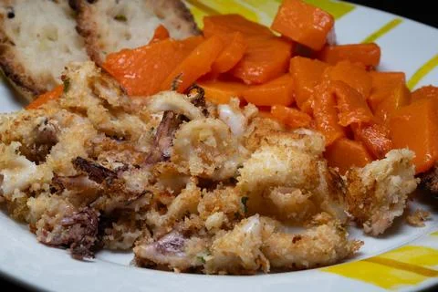 Baked squid gratin, with a side of pumpkin 스톡 사진