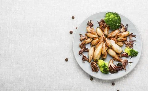 Baked squid with vegetables Stock Photos