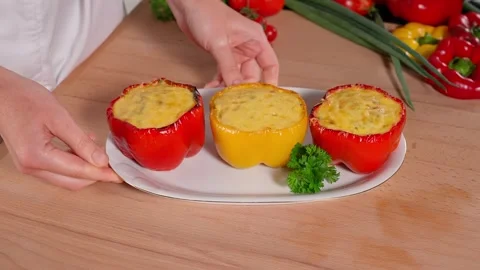Baked stuffed  peppers with a mixture of eggs and vegetables with cheese Stock Footage 270151005