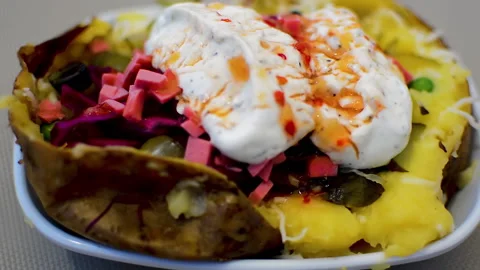 Baked stuffed potato. Stock Footage 152956983