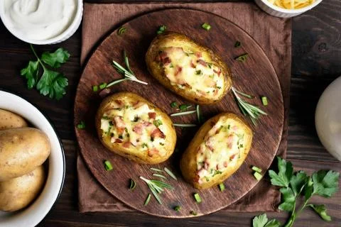 Baked stuffed potatoes Stock Photos