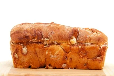 Baked sugar bread in closeup on cutting board Stock Photos