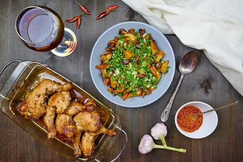 Baked vegetables and chicken with pomegranate juice Stock Photos