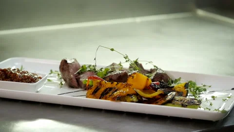 Baked Vegetables with Beef Steak Stock Footage 132216396