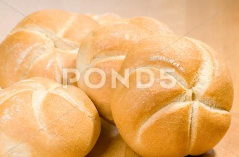 Baked wheat kaiser rolls crusty products Stock Photos