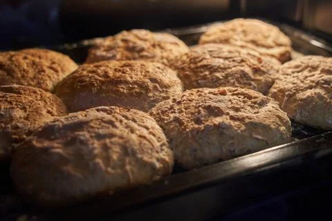 Baked whole wheat seeded bread with selective focus. Stock Photos