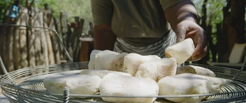 Baker baking buns on open fire stove Video stock 106211498